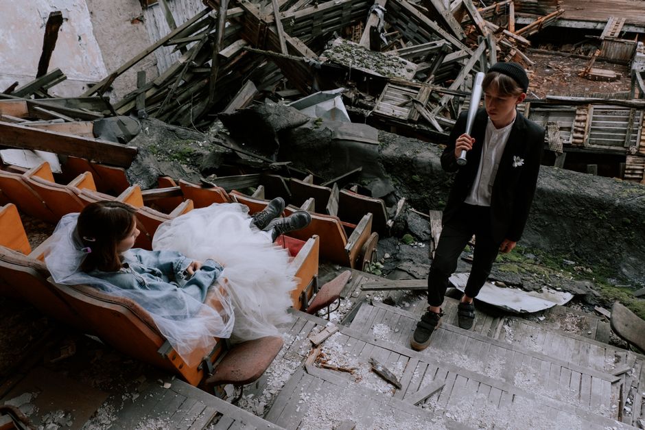 Cinematic wedding couple embracing in a scenic location